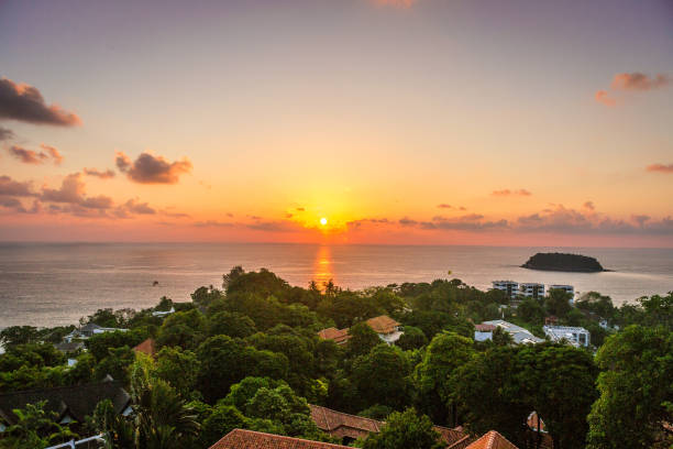 istock sunset scene and clouds over Kata Beach in Phuket, Thailand 1181624166