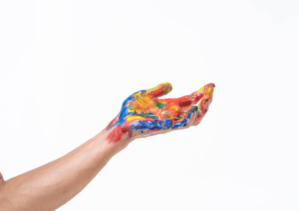 istock Man hand in colorful on white background 1181624375