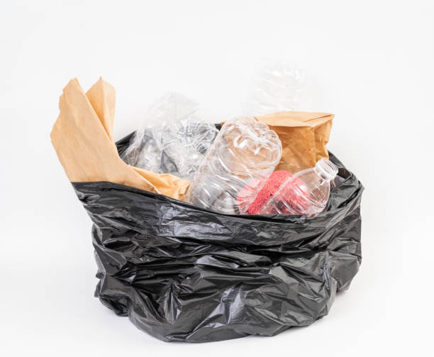 istock Trash bag with recycle garbage on white background 1181624458