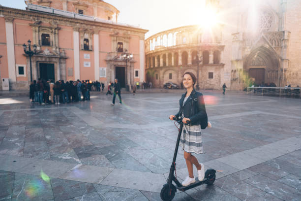 istock Tourist woman exploring Valencia on scooter 1181629335