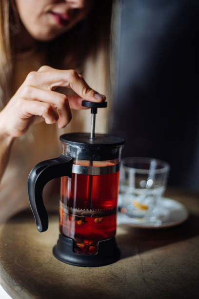 istock Woman preparing winter tea 1181632063