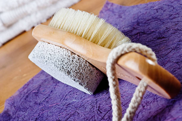 istock Brush and Pumice Stone on Towel 118163319