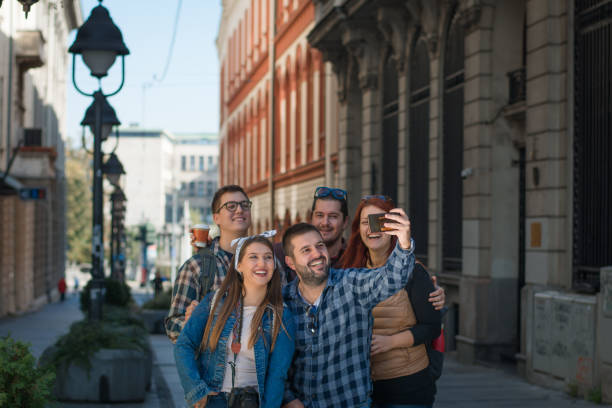 istock Group of young backpackers in the City 1181637557
