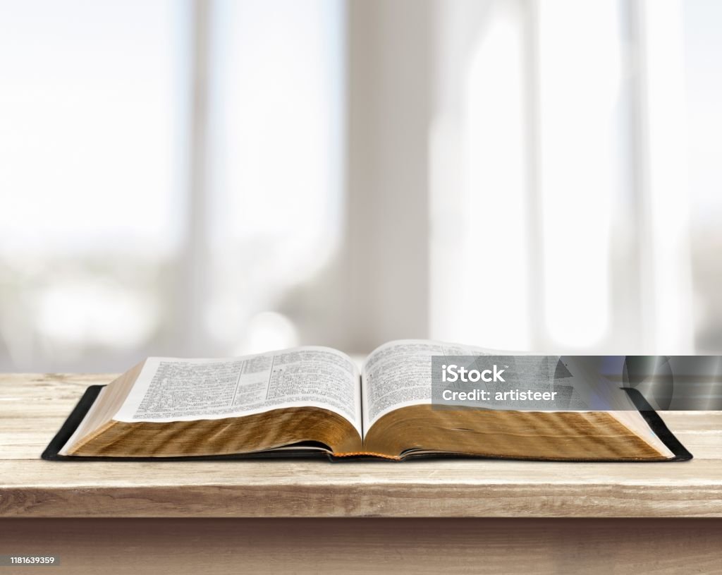 Book. Open book on old wooden table. Open Stock Photo