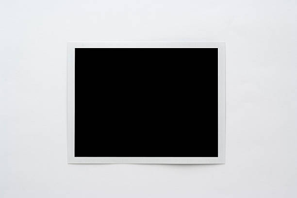 istock Isolated shot of blank polaroid on white background 118164063