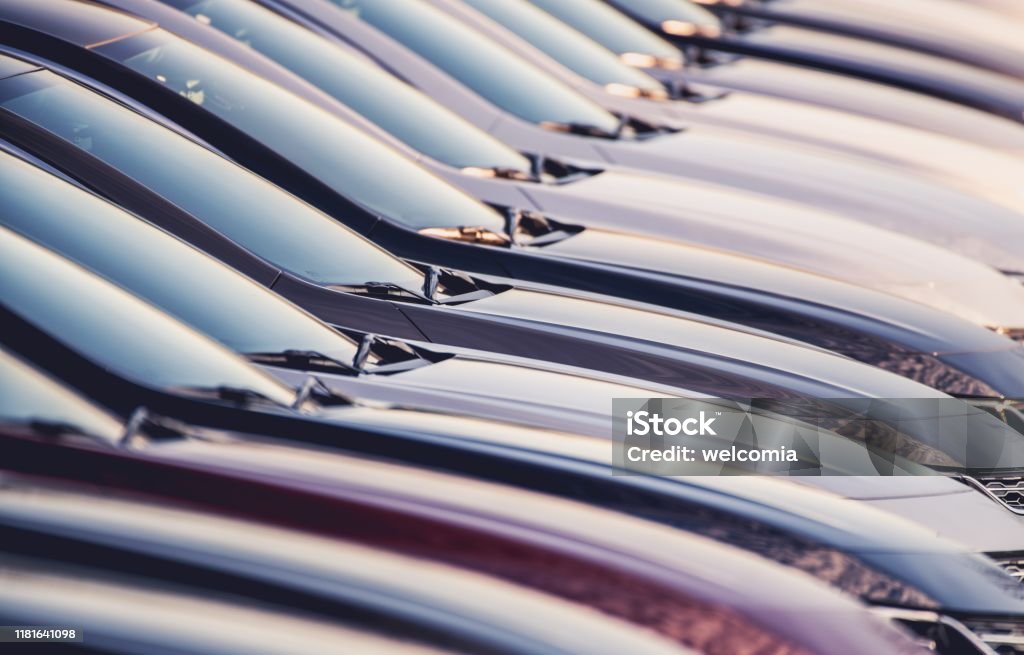 Line of New Vehicles For Sale Line of New Vehicles For Sale. Car Dealership Lot. Transportation Industry Theme. Used Car Selling Stock Photo