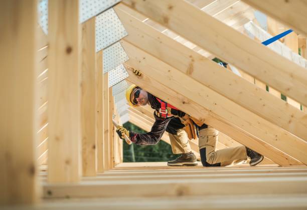 Working Construction Contractor Caucasian Contractor Working with Wooden House Frame in the Attic Section. work tool nail wood construction stock pictures, royalty-free photos & images