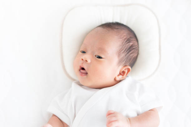 istock Baby on crib 1181646622