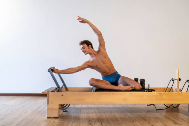 istock Pilates exercise on the reformer machine 1181648369