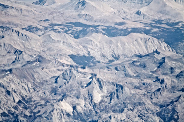 Vast mountain ranges looking down from plane