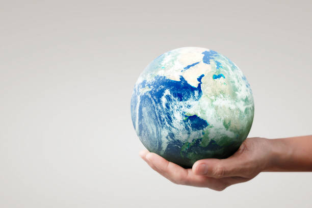 istock Globe ,earth in hand, holding our planet glowing. Earth image provided by Nasa 1181650089