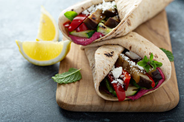 istock Grilled vegetables and hummus wraps 1181650199