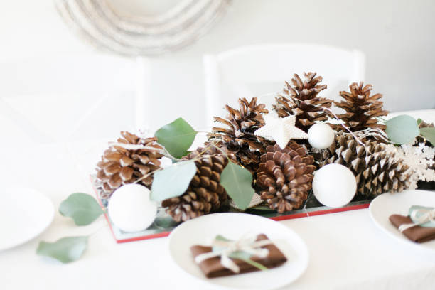 istock Modern white and brown Christmas winter decorations with rustic wreath 1181650410