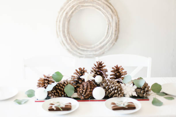 istock Modern white and brown Christmas winter decorations with rustic wreath 1181650452