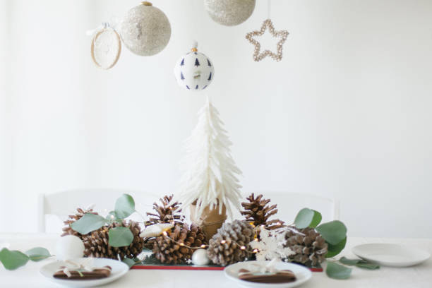 istock White and brown Christmas table decorations with eucalyptus leaves 1181651326