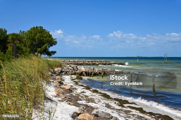 Stone Jetties On Island Stock Photo - Download Image Now - Florida - US State, View Into Land, Distance Marker