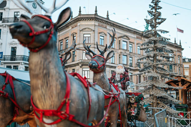 Reindeers with Santa claus at the Christmas market in central Copenhagen, Denmark stock photo