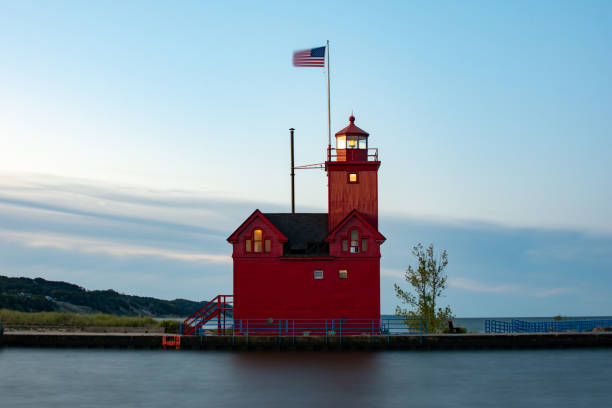 istock Big Red Lighthouse as the sun rises. 1181660841