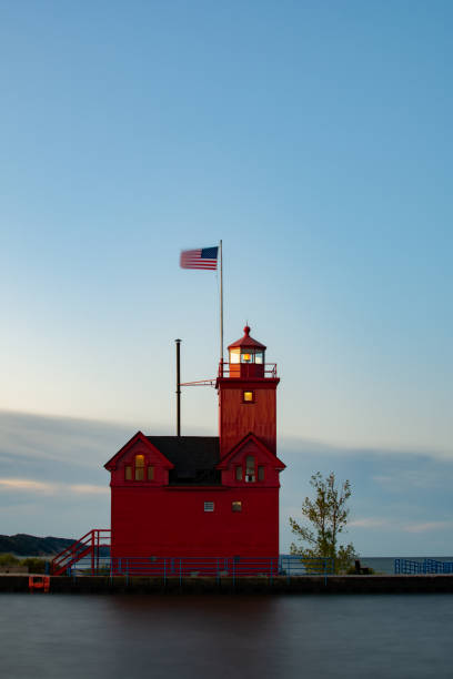 istock Big Red Lighthouse as the sun rises. 1181660876