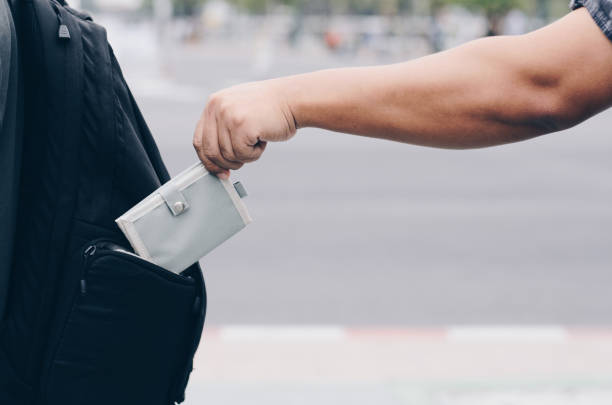istock Theft of a purse from a pocket behind 1181660939