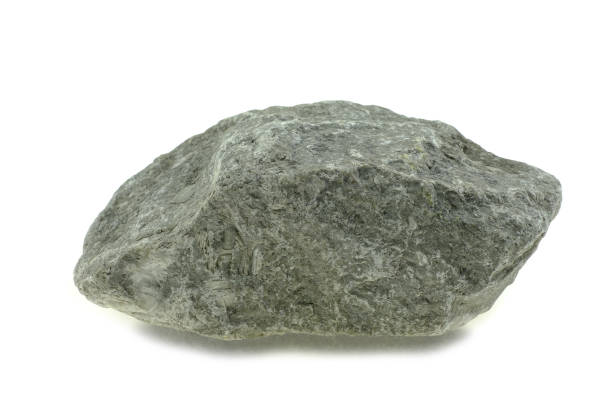 istock Close up stone isolated at white background 1181660969
