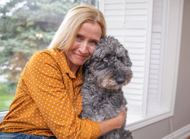 istock Happy Woman With Her Pet 1181665066