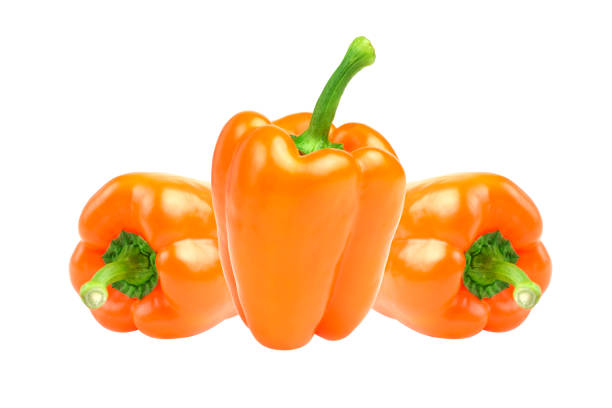 istock Fresh bright orange peppers on a white background. Fresh orange pepper isolated on white background 1181665254