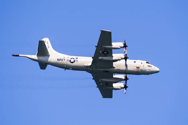 Oct 12, 2019 San Francisco / CA / USA - Close up of US Navy Lockheed P-3C Orion aircraft in mid-flight;