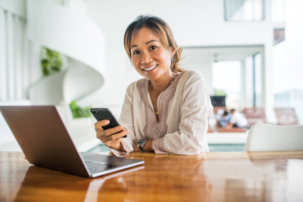 istock Thai family using technology in their everyday live. 1181671093