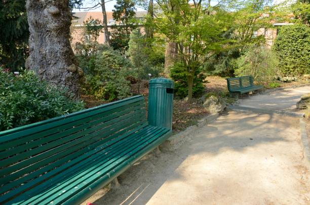 istock Lonely benches at garden 1181671903