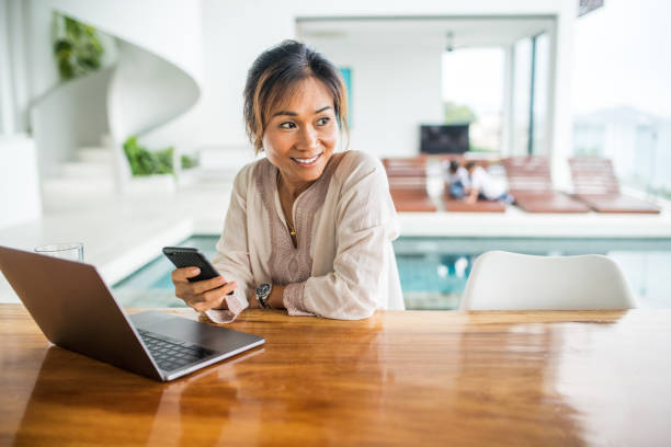 istock Thai family using technology in their everyday live. 1181672124