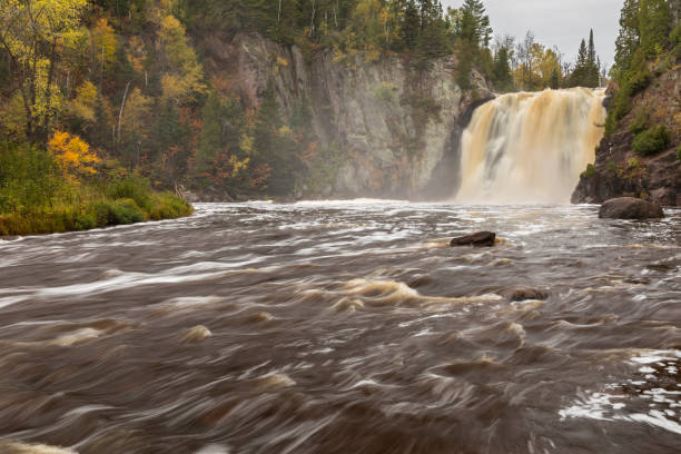 istock Baptism River Waterfall In Autumn 1181672131