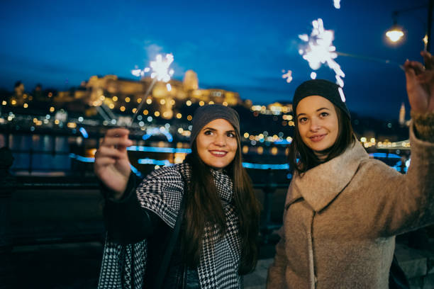 istock Young woman playing sparkler 1181673064