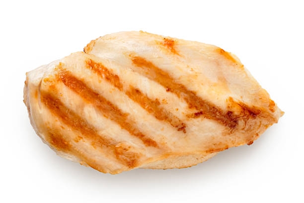 istock Whole grilled chicken breast with grill marks isolated on white. Top view. 1181673291