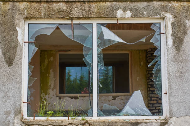 istock Broken windows of an abandoned hotel 1181676793