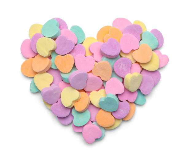 candy heart pile - lots of candy hearts imagens e fotografias de stock