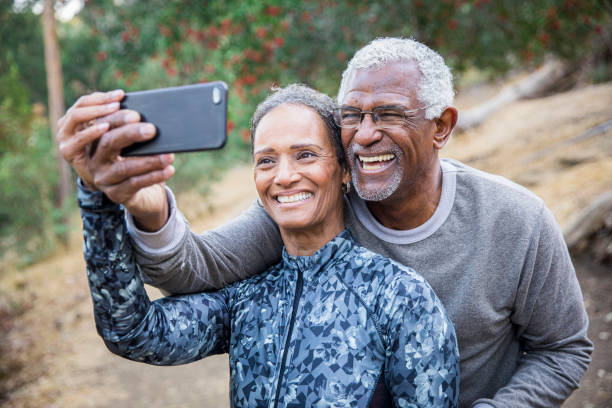 istock Senior Black Couple Taking Selfie During Exercise 1181684454