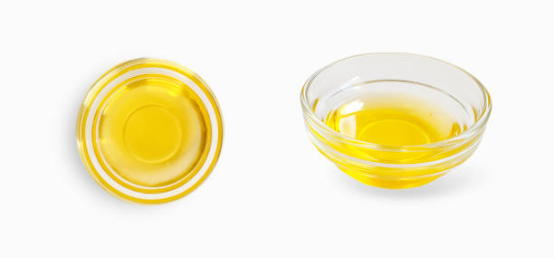 istock olive oil in a glass jar isolated 1181684486