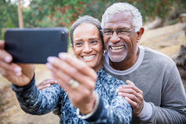 istock Senior Black Couple Taking Selfie During Exercise 1181684804