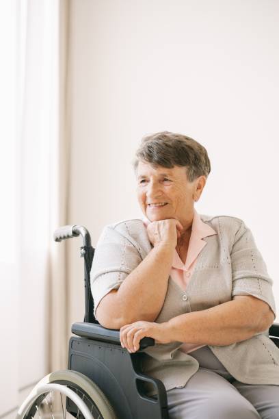 istock Woman on a wheelchair 1181686583