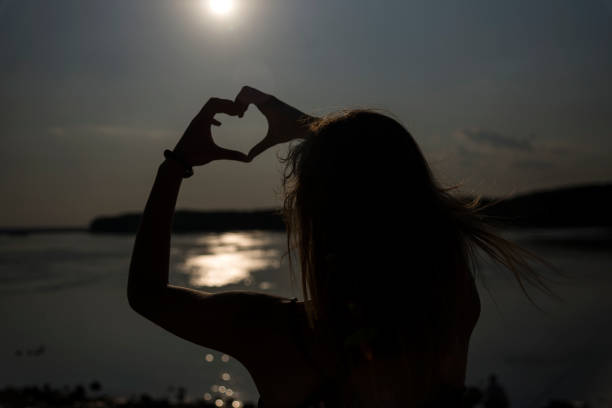 istock Silhouette of woman with sunlight 1181687399