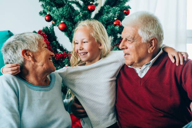 istock Senior couple with granddaughter 1181690588