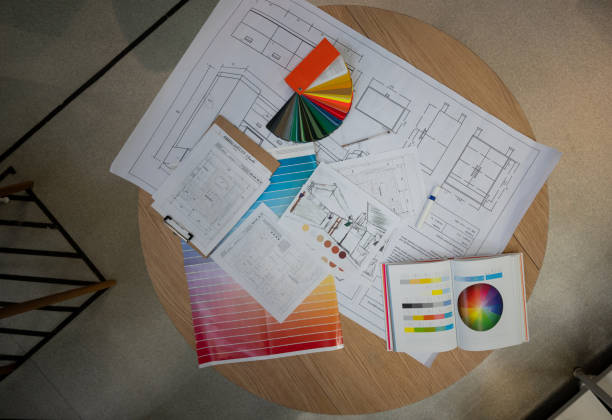 istock Architects and designers working tools, blueprints, designs, color swatches 1181691173