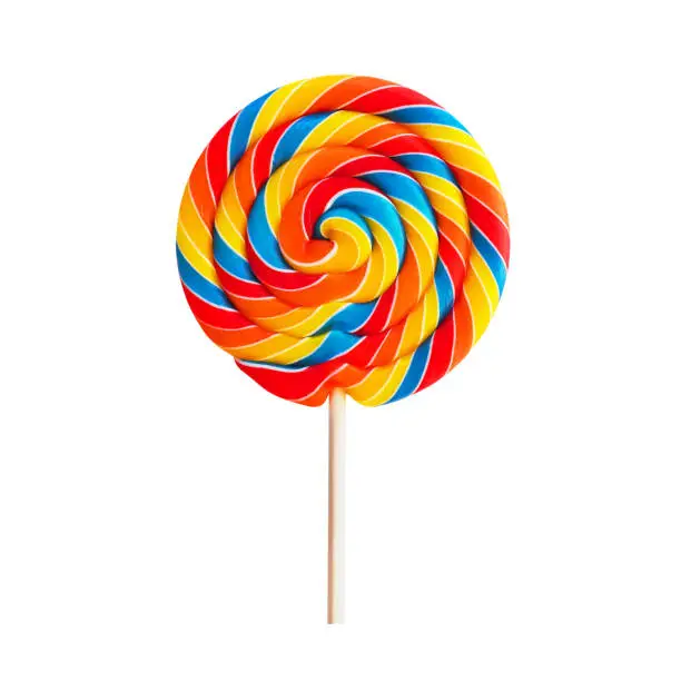 Photo of Colorful lollipop swirl on stick isolated on white background. Striped spiral multicolored candy