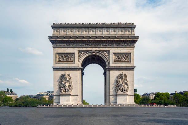 The arch of triumph An emblematic monument of Paris, the Arch of Triumph, built between 1806 and 1836 by order of Napoleon Bonaparte to commemorate the victory at the Battle of Austerlitz. avenue des champs elysees photos stock pictures, royalty-free photos & images