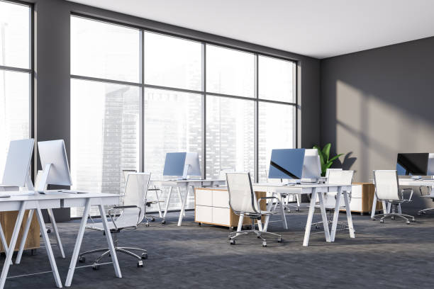 istock Panoramic gray office corner with cityscape 1181696703