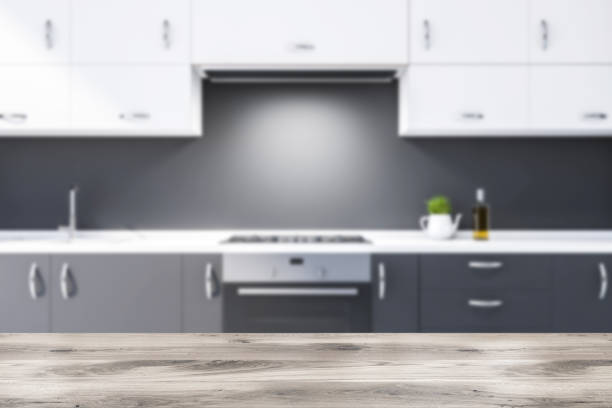 istock Close up of dark gray kitchen countertops, blurred 1181700156