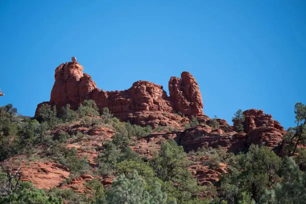 A rock formation in Sedona Arizona which looks like the Snoopy dog character.