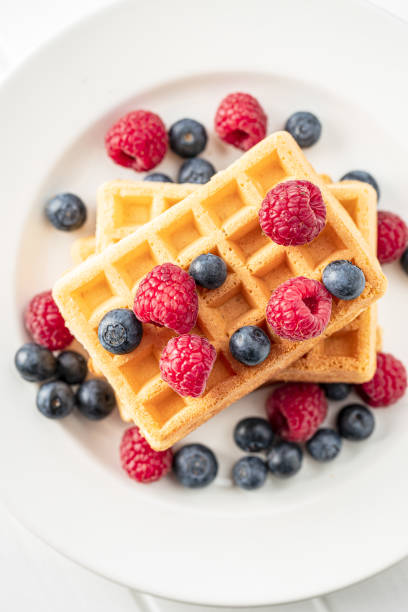 istock Waffles with blueberries and raspberries. 1181701382