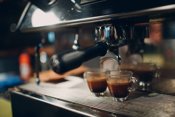 istock Barista makes coffee in a coffee machine 1181701426